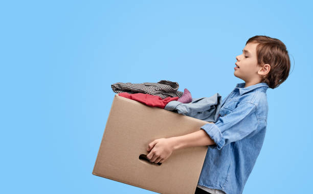 1,900+ Child Carrying Heavy Stock Photos, Pictures & Royalty-Free Images -  Istock | Child Carrying Heavy Basket, Child Carrying Heavy Box, Child  Carrying Heavy Bag